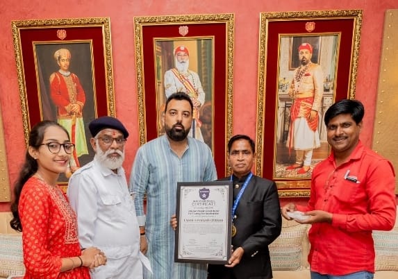 ### Dr. Lakshyaraj Singh Mewar Honors Chitoara with World Record Certificate