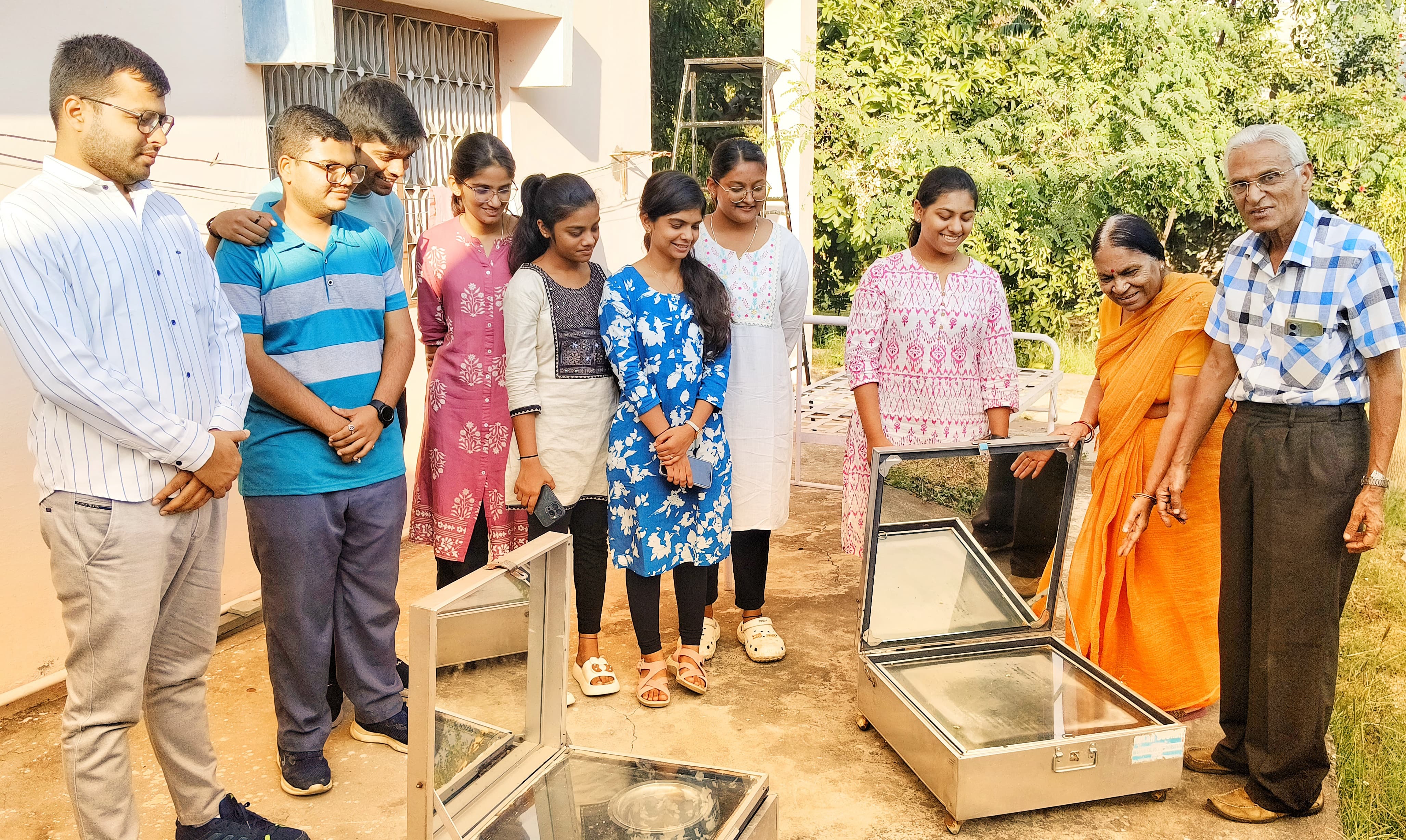 Students Learn Solar Cooker and Rainwater Harvesting System at Pacific Institute of Medical Sciences