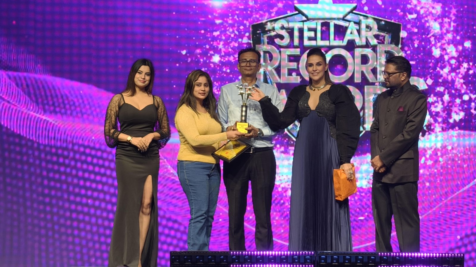 Social worker Uttam Bafna honored by Bollywood actress Neha Dhupia