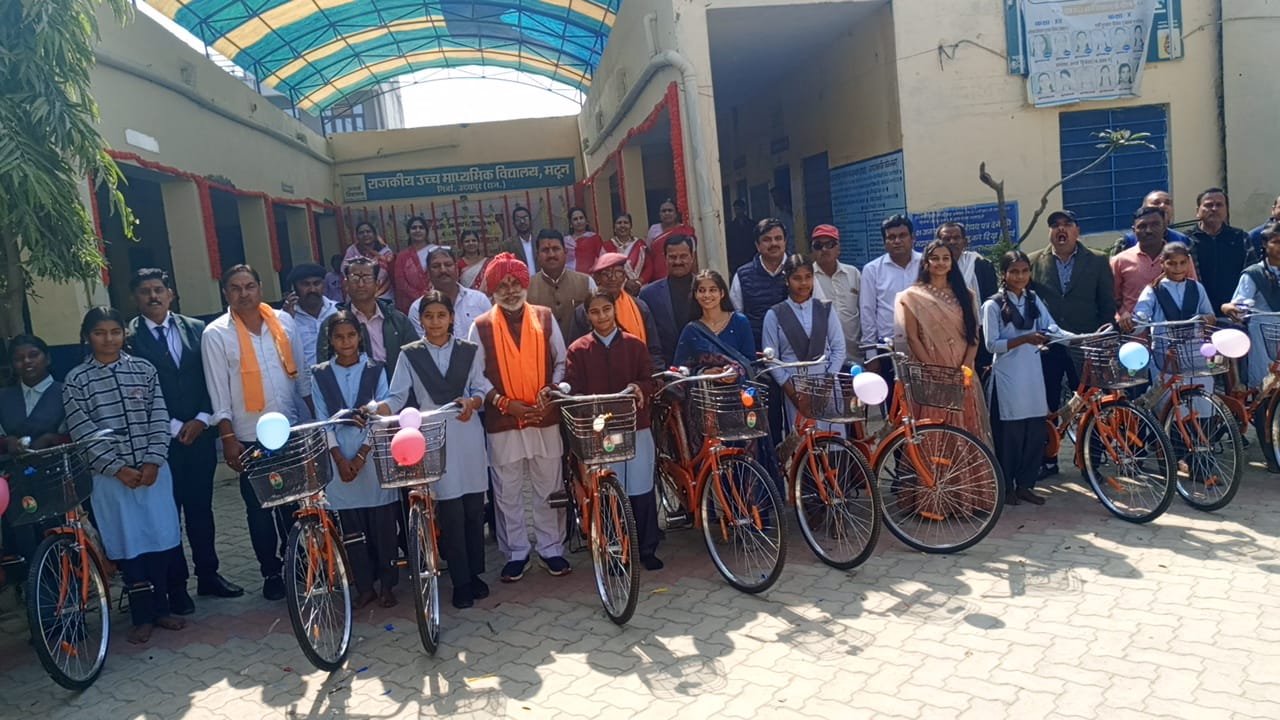 Smiles Light Up Faces of Girls as They Receive Bicycles