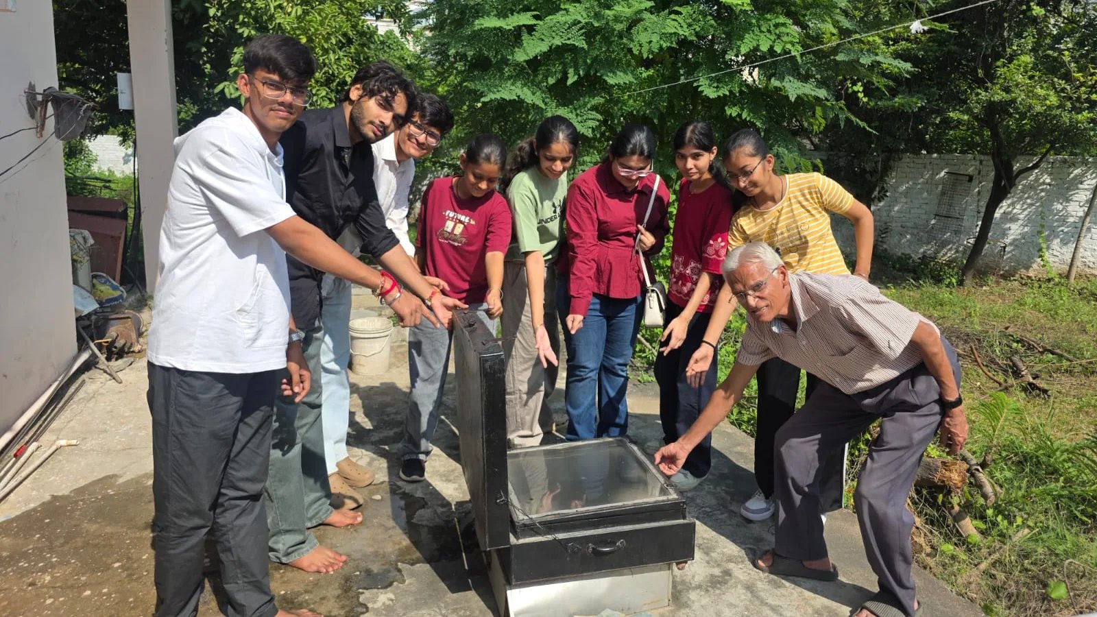 Medical Students Learn About Rainwater Harvesting and Solar Cooking